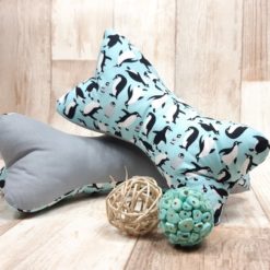 Leseknochen mit Pinguinen türkis grau