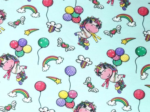 Stoff mit Regenbogen und Einhorn Detail