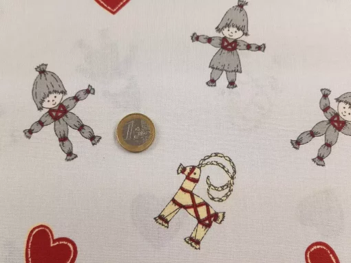 Weihnachtsstoff Baumwolle natur Strohmann und Strohziege Euro als Größenvergleich