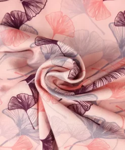 Jersey Stoff mit Ginkgo Blättern in rosa Strudel