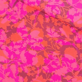 Viskosestoff mit Blumen und Blättern in pink und orange