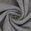 SanDaLu Merino Fleece in Hellgrau drapiert